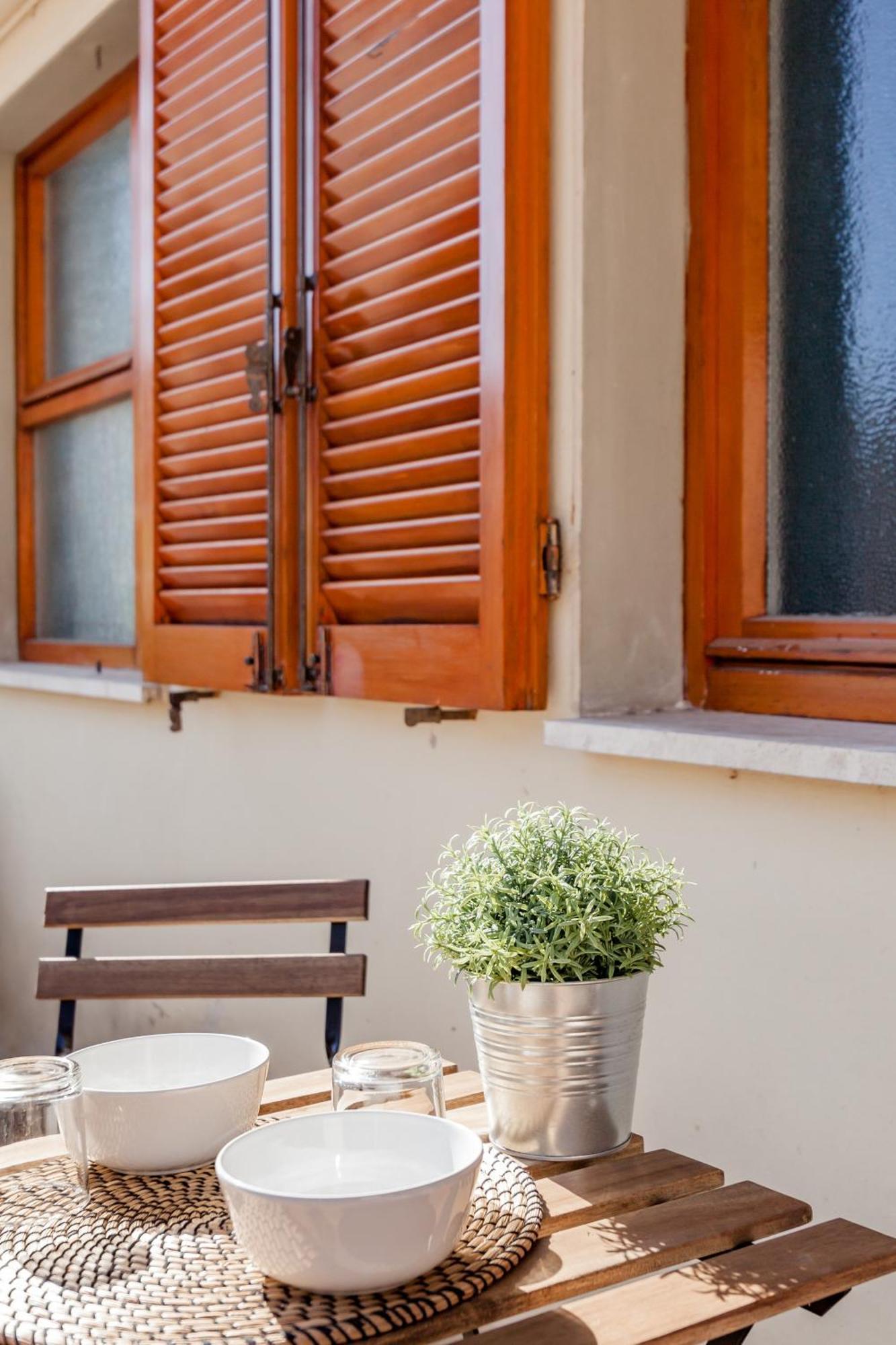 Open The Classic Wooden Shutters At A Cozy Nest Florence